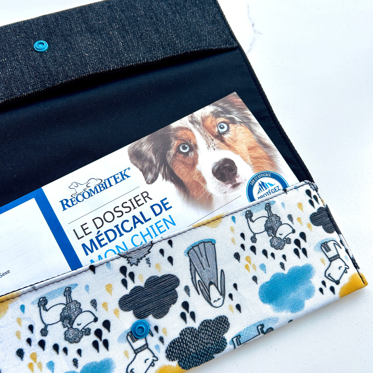 Protège carnet de vaccination Lolikö Sous la pluie